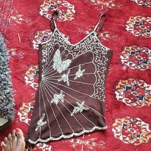 Unik topp  - I bra skick och passar xxs _ s.250 inklu frakt 