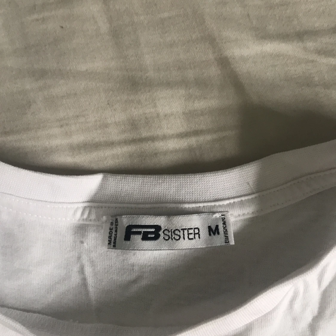 Vit långarmad tröja 