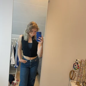 Träningstopp - Svart träningstopp med dragkedja. Storlek S/XS. 60kr+frakt