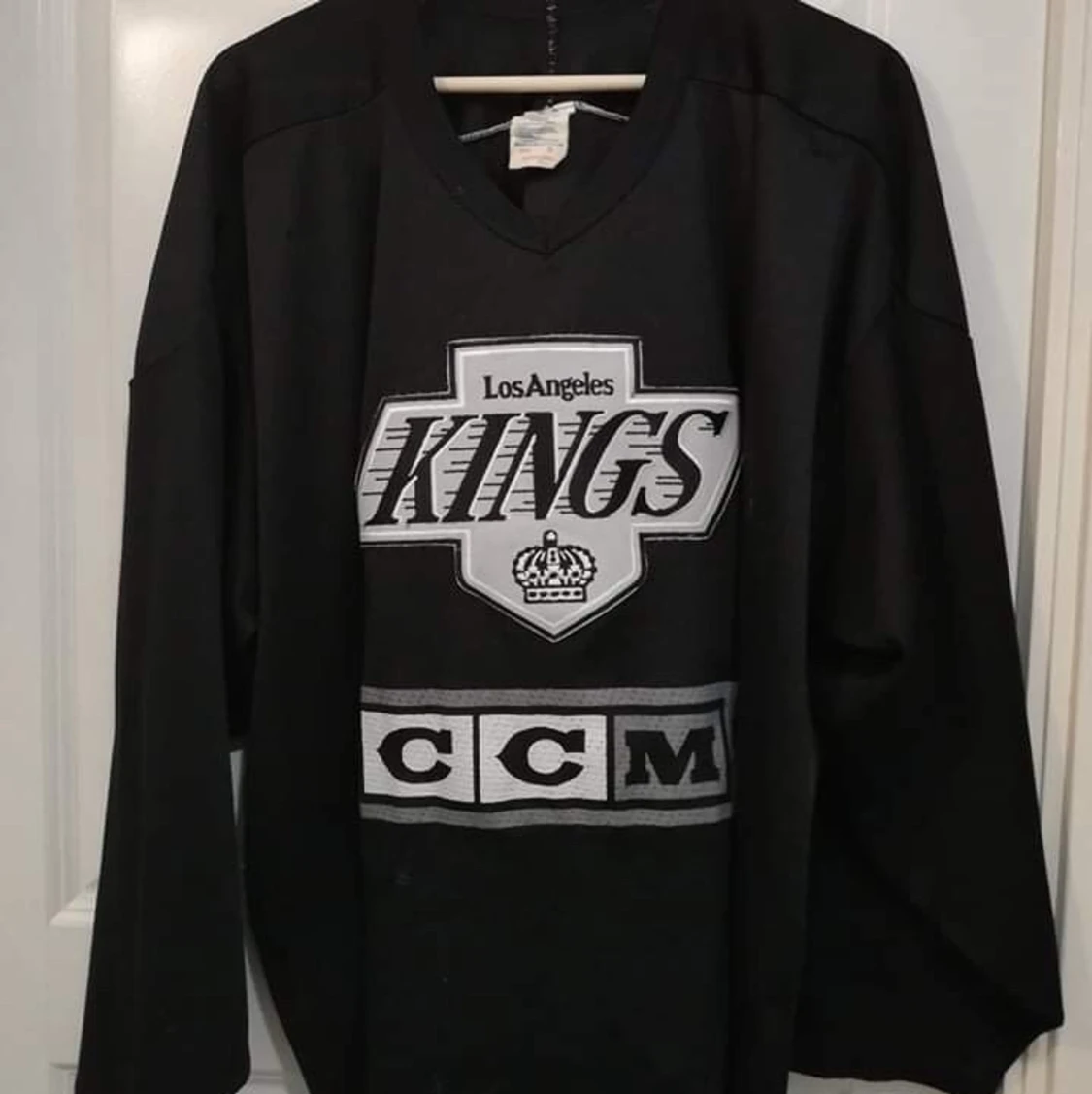 Svart hockeytröja - 90