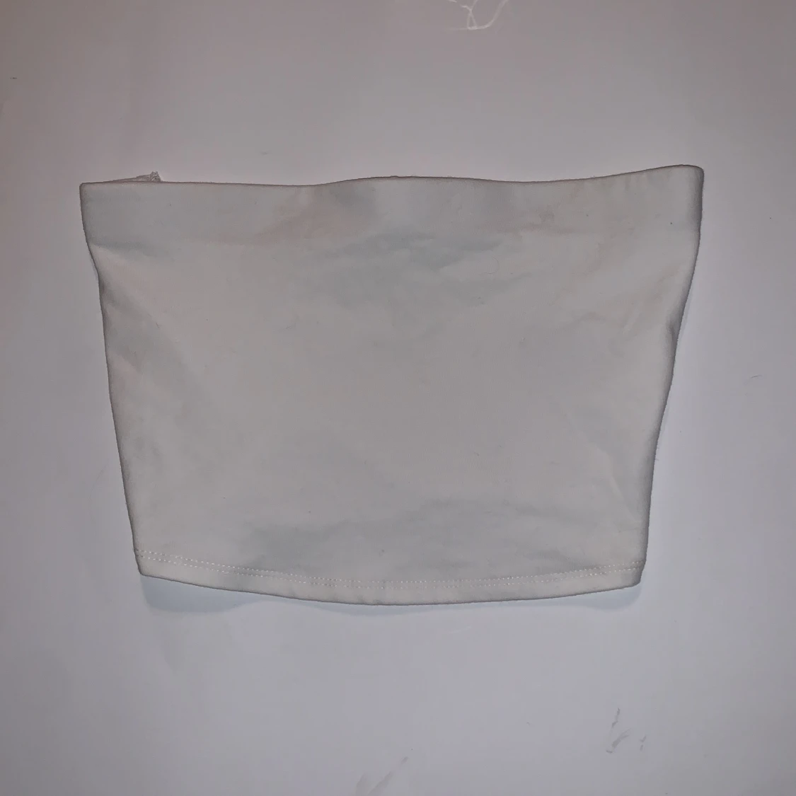 Vit topp utan axelband