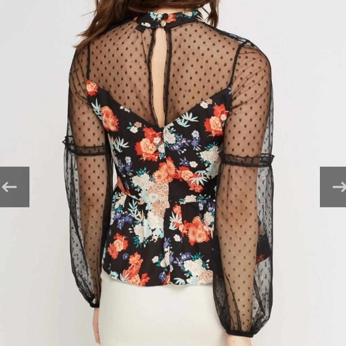 Blommig peplum-blus - 90