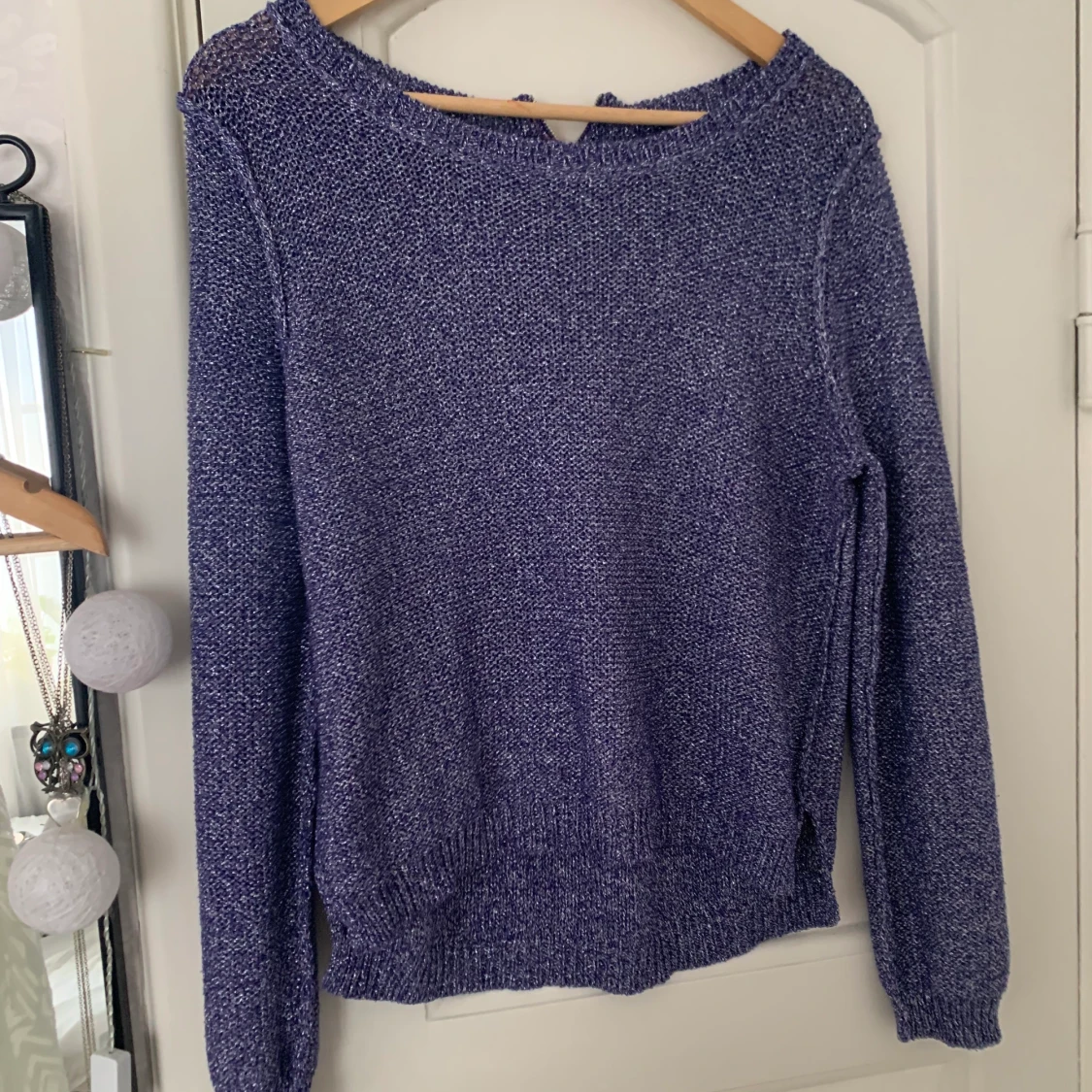 Stickad glittrig tröja