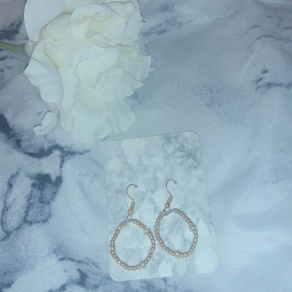 Ett par handgjorda örhängen. - 90