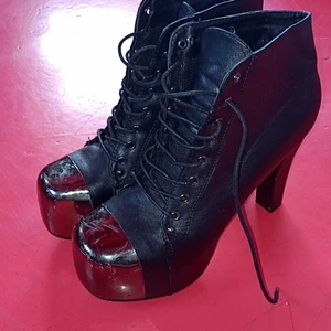 Funky high heels - They are alittle used, but they are still very strong and good quality, they don't break easily. Looks sexy and funky.