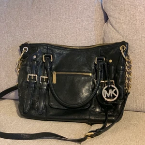 Michael Kors - I skinn. Använt fint skick. 