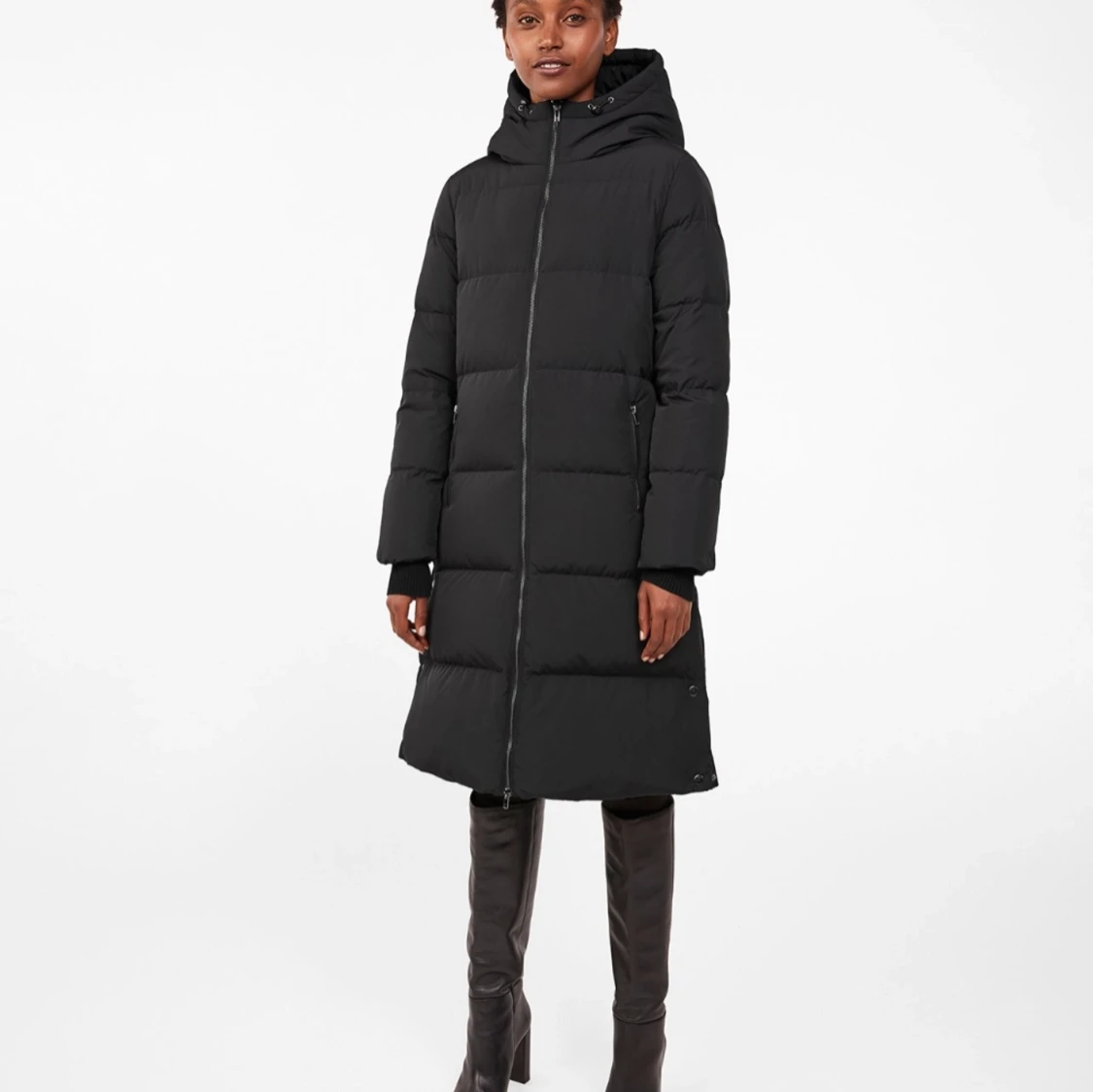 Lång pufferdunjacka. - 90