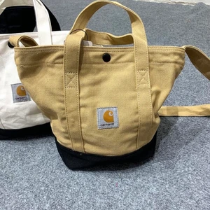 Carhartt tote bag/ mail bag    - Gjort av ganska tjockt tyg.                                                   Höjd 27CM Bredd  34.5CM Djup 6CM                                          Köptes för ett tag sedan men används aldrig, inget slitage! 