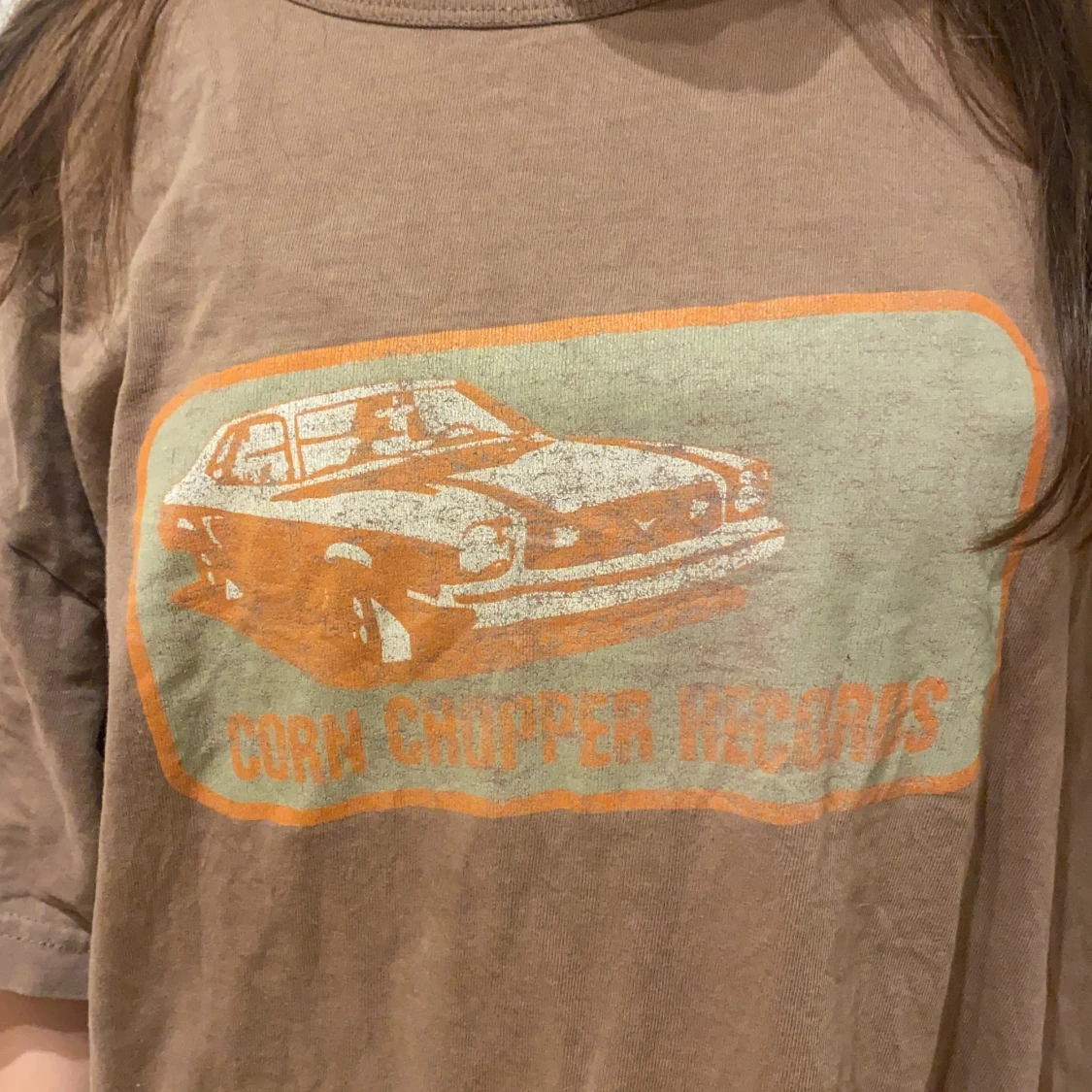 En skitsnygg vintage tröja i brun färg - 90