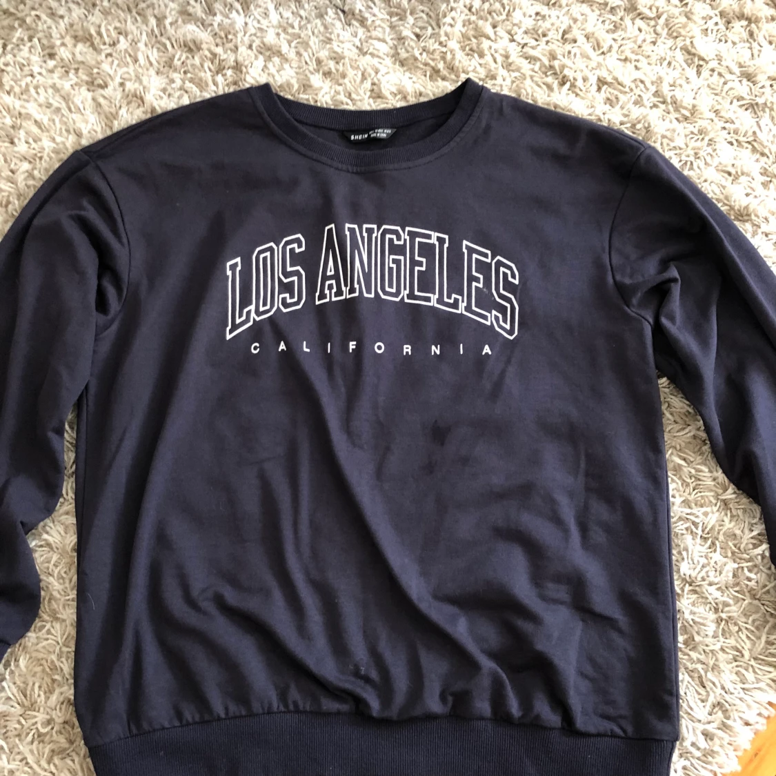 Sweatshirt med tryck i storlek s