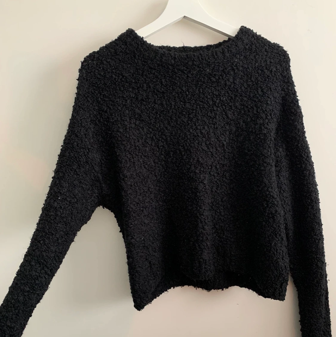 Svart stickad tröja