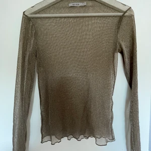 Glittrig topp - Bra festtopp! 