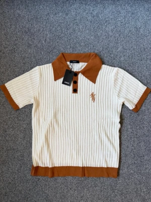 Amiri white & brown polo knitted shirt - Size M, true to size. Brand new and never worn, very comfortable and great quality.