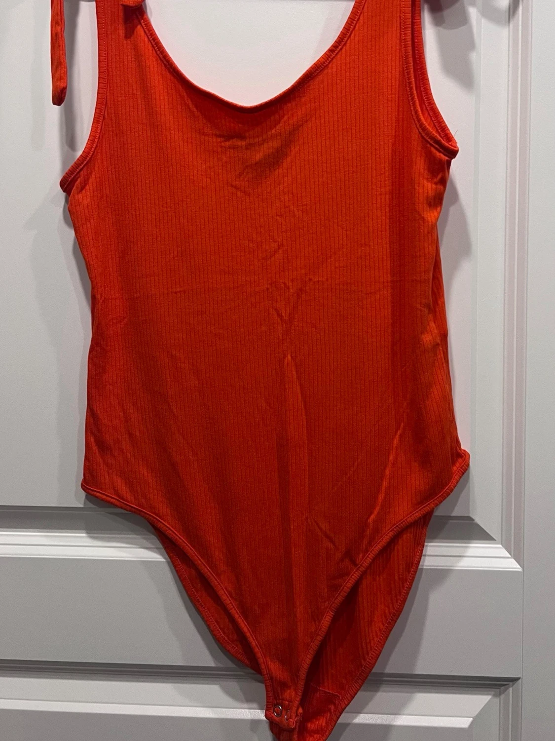 Röd/orange ribbad body från Primark