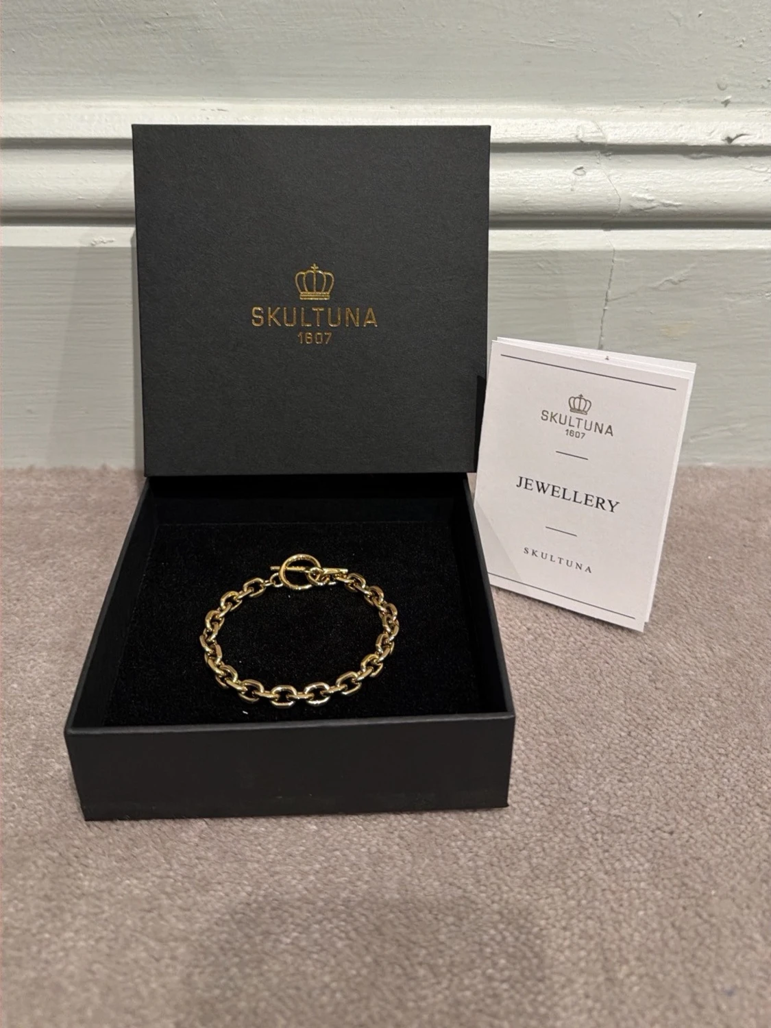 Guld kedjearmband Skultuna