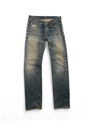 90s Archive TMT Denime vintage Japanese selvedge jeans - Crazy rare pair of TMT x Denime selvedge denim straight from Tokyo.  Size: W32 L34   Made in Japan  Stacks really nicely because of the long inseam.  Great fading but no real flaws. A lot of room for making your own fades