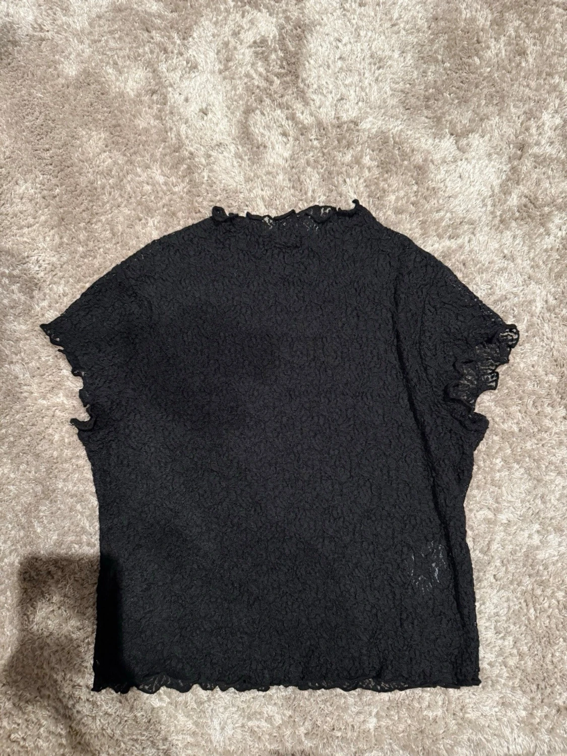 Svart spetsig topp från C&A