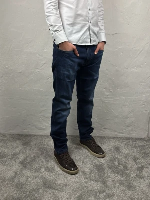 Replay jeans  - Ett par riktigt snygga jeans från Replay i storlek W40 L34 i modellen Anbbas Hyperflex 