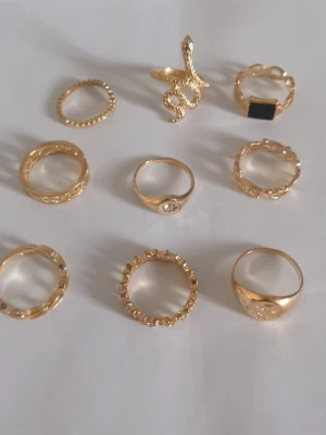 9-pack ringar  - Materialet är alloy. (#123)