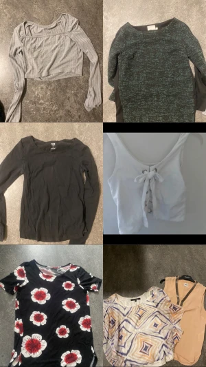 Tröjor  - Supersnygg vit croppad linnetopp med snörning framtill. Toppen har breda axelband och en tight passform som ger en trendig look. Perfekt att matcha med höga jeans eller kjol för en cool stil.