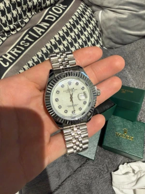 White and silver rollie watch - Brand new got the plastic. Never used