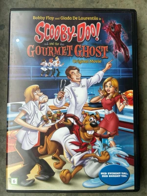 Scooby doo and the gourmet ghost dvd - DVD-film med "Scooby-Doo! And the Gourmet Ghost". Filmen har svenskt och norskt tal. Speltid: cirka 74 minuter. Region 2.  Finns på språk: Svenska, Norska, Franska, Spanska, Engelska   OBS!! skivorna är begagnade så det kan förekomma repor/hairlines på skivorna, men då jag kollar igenom alla filmer jag säljer garanterar jag att alla funkar felfritt om inget annat står! :)