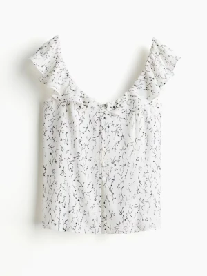 Snygg sommar topp - aldrig använd och lapparna är kvar