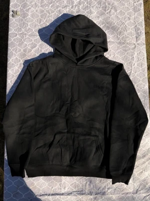 Essentials black hoodie - Size M, true to size. As new. Very comfortable and never worn