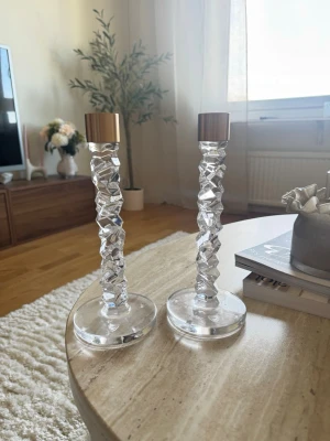 Orrefors ljusstakar  - Helt oanvända orreforsljusstakar i mässing 