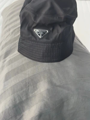 Prada hatt - Skick 10/10 storlek m passar alla
