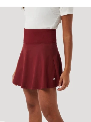 Vinröd padelkjol från Björn Borg - Snygg vinröd kjol från Björn Borg med bred, ribbad midja och lätt utsvängd passform. Kjolen har en liten logga framtill och är tillverkad i ett stretchigt material som passar perfekt för en aktiv livsstil.