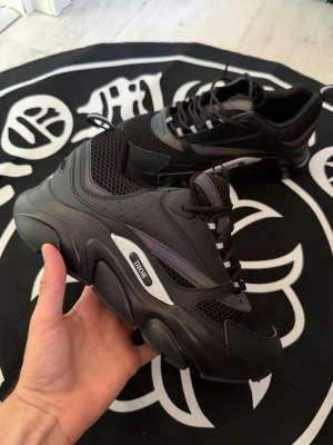 CD black shoes B22 - Size 43 - Size 43, true to size. Very comfortable and fits nicely. Brand new