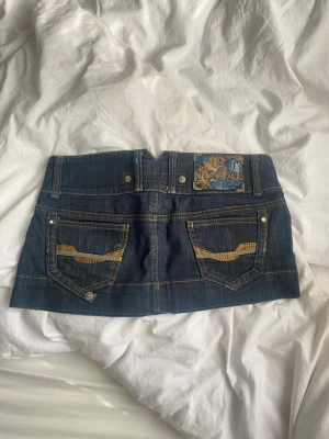 Mörkblå minikjol - Jättesöt, storlek 34🩵🩵🩵midjemått 38 cm längd 28 cm