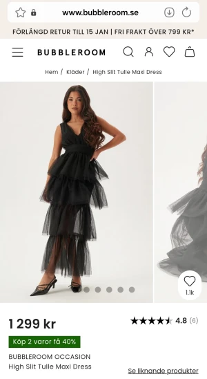 Svart maxiklänning i tyll från Bubbleroom - Snygg svart maxiklänning från Bubbleroom, endast använd en gång.  Klänningen har hög slits, djup v-ringning och voluminösa volanger som ger en dramatisk look. Perfekt för dig som vill sticka ut på festen. Den har tyvärr ett hål på baksidan då jag ville stryka den och brände då ett hål, därav priset. I och med färgen och volanger försvinner hålet och blir osynlig. 