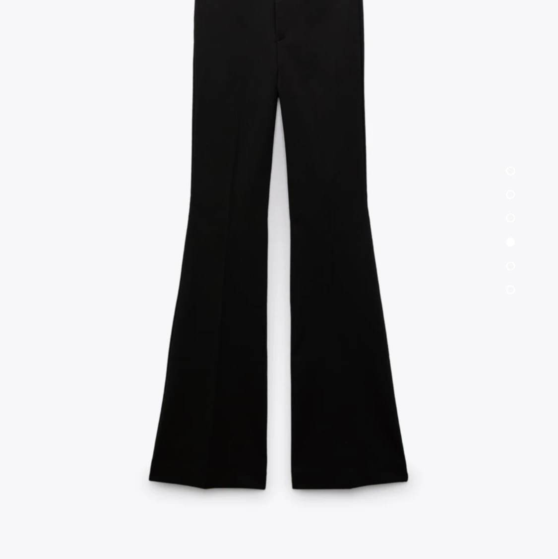 Utsvängda kostymbyxor 