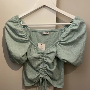 Helt ny topp - Med lappar