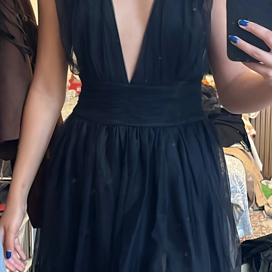 svart klänning i storlek small