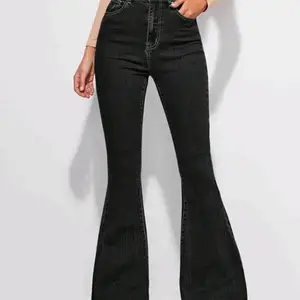 Stylist chic Stretchy black flare jeans 