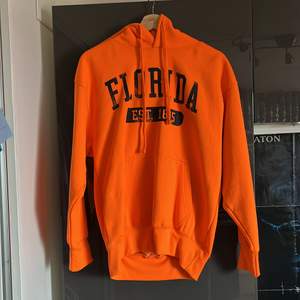 Orange hoodie, regular fit