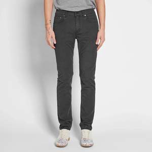 The Acne Studios Ace Ups Jean is a slim cut jean with a slim leg, regular waist and taper from the knee. Made from a cotton blend black denim, this contemporary silhouette features classic Acne detailing such as flat rivets on the back pockets, narrow stitched seams, three needle stitching on inner leg and classic 5-pocket set up.
