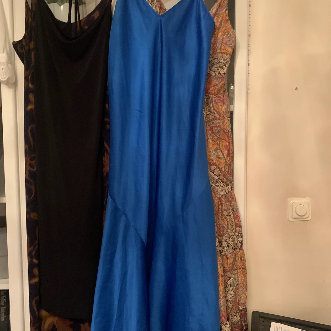 Blå siden klänning