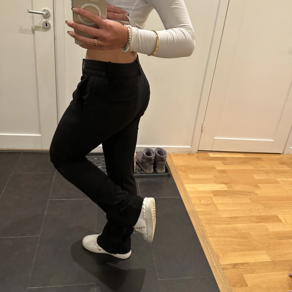 Svarta låga kostymbyxor