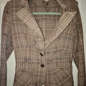 Kostym och kofta - Två stycken olika