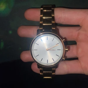 Kronaby klocka - En hyfsat ny kronaby klocka i guld färgat