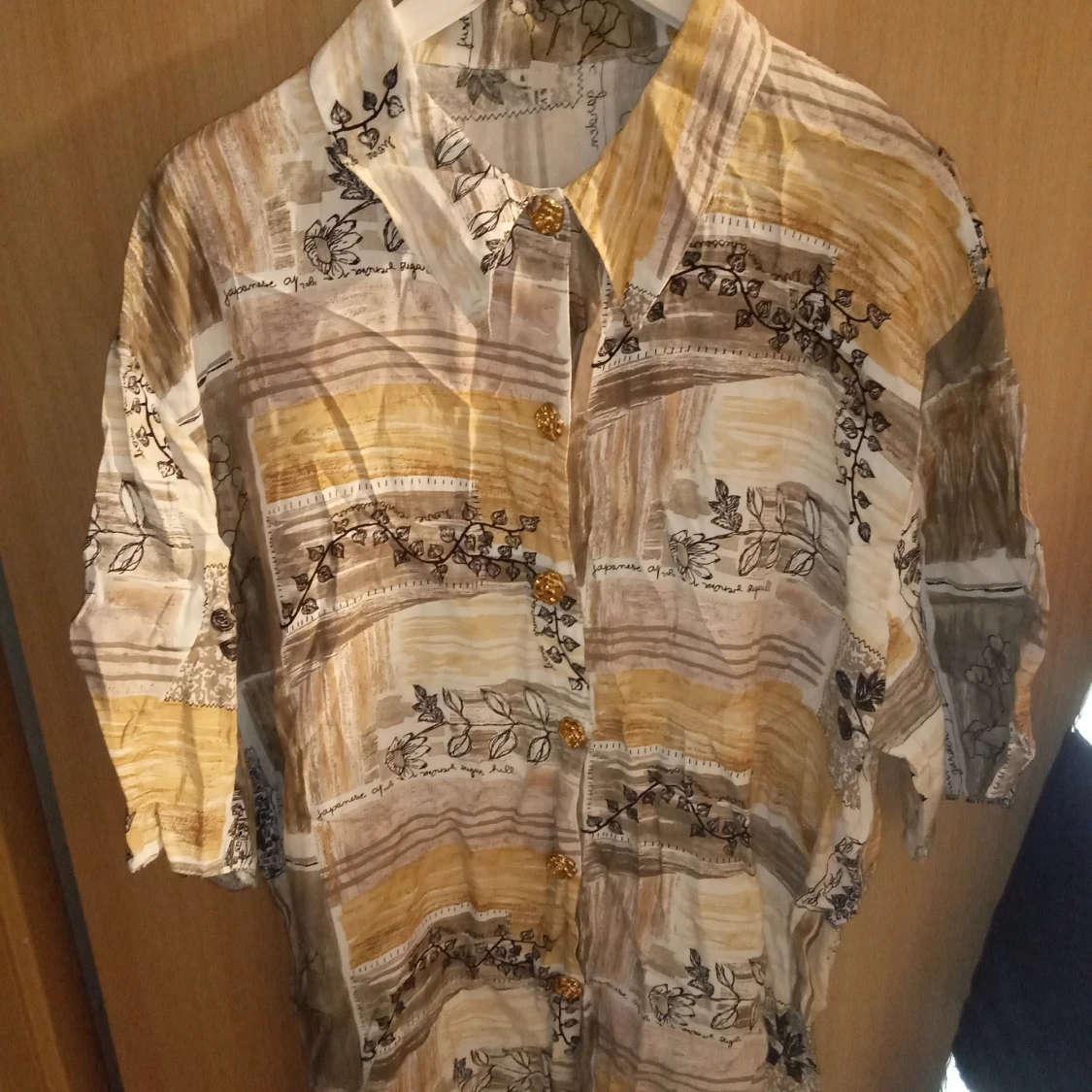 Blus mönstrad stl M /L.