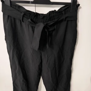Tygbyxa  - Ny och aldrig använd. 