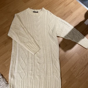 Klänning - En stickad klänning som inte kommer till användning 