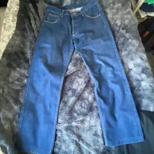 Vintage blåa Lee jeans