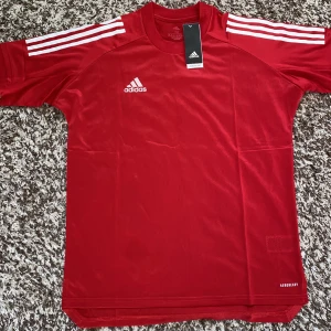 Adidas jersey - Condition: un used with tag  Have bought too many football t-shirts and trying to get rid of this 