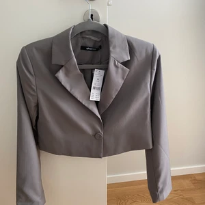 Kavaj - Ny oanvänd kavaj 